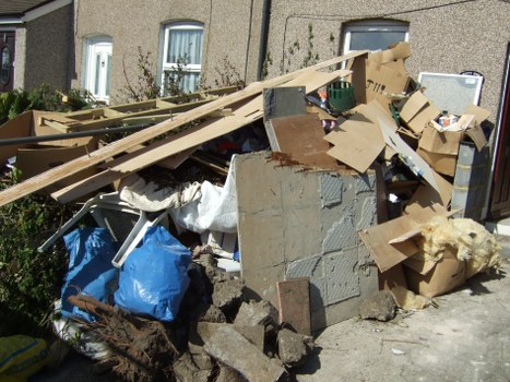 Piles of old furniture ready for recycling in Sutton