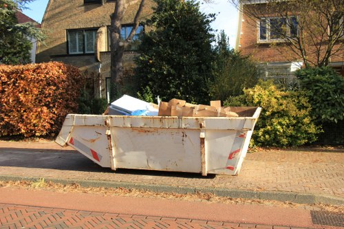 Workers managing construction waste